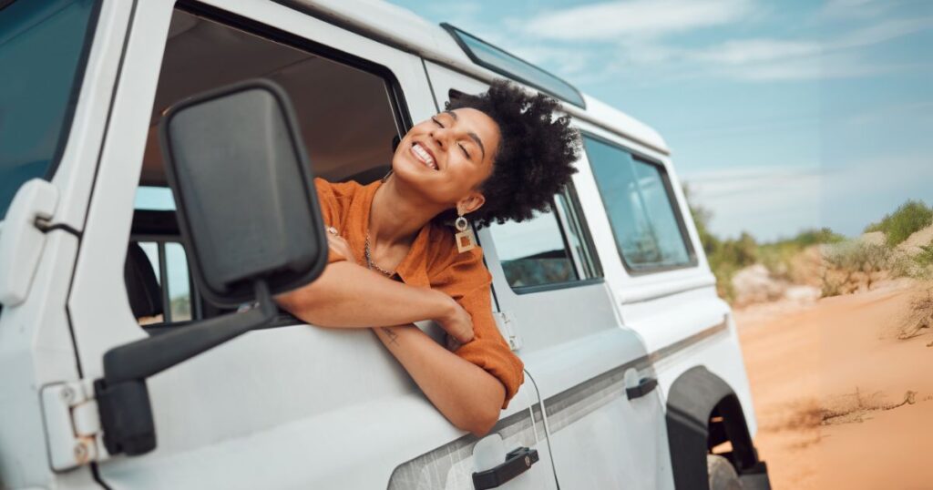 Relax black woman on road trip