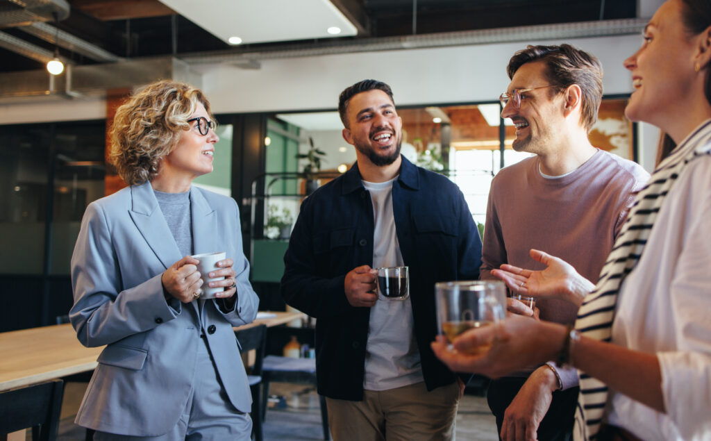 having a coffee break in an office stock photo...